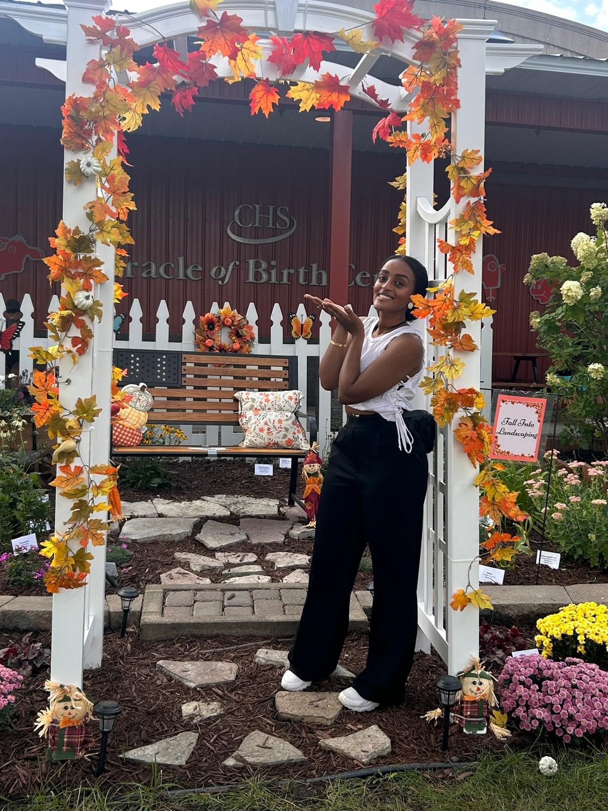 Egeziharya, Ethiopian-American doula, standing at a birth center entrance